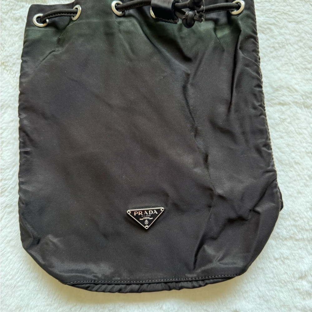 100% authentic Prada nylon bucket bag. Please note of the discoloration. - Picture 1 of 6